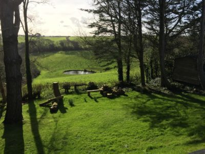 View of bench and pond at Crockwood Farm Retreat